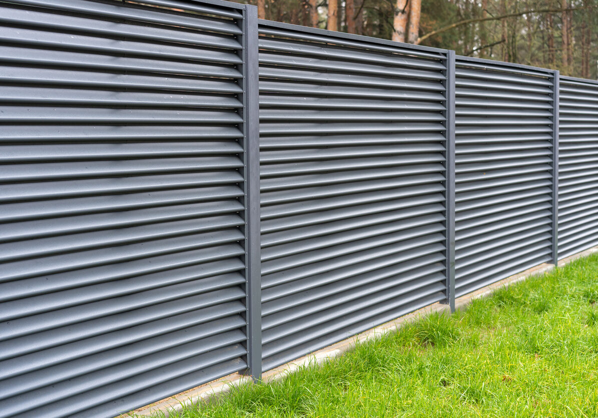 blank metal fence in the village.